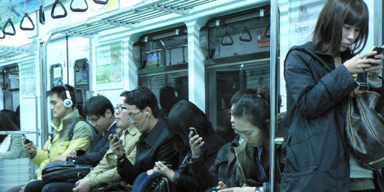 korean smartphone users on subway.jpg
